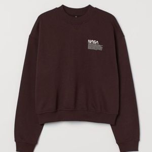 Brown pull-over sweater with the word NASA